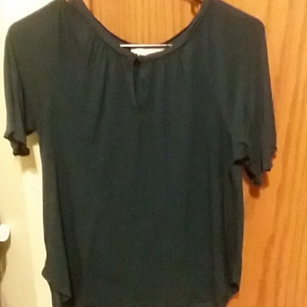 Dark blue tee shirt with button in front